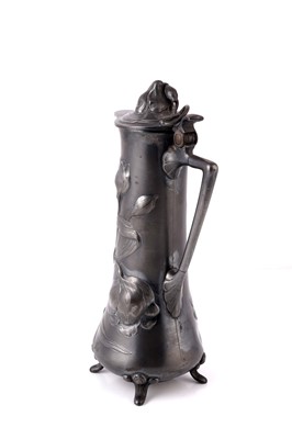 Lot 487 - WMF: an early 20th Century Art Nouveau pewter claret jug