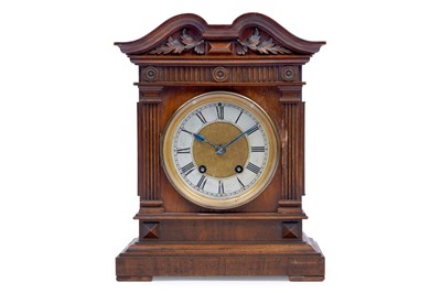 Lot 181 - Lenzkirch: a walnut 8-day mantel clock