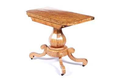 Lot 643 - A 19th Century Birdseye maple tea table