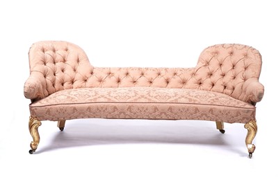 Lot 645 - A Victorian style sofa, the deeply buttoned camel-back and curved seat