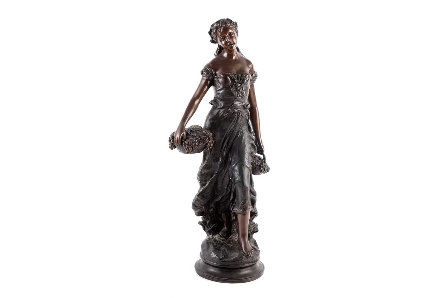 Lot 483 - A patinated bronze figure of a farmhand