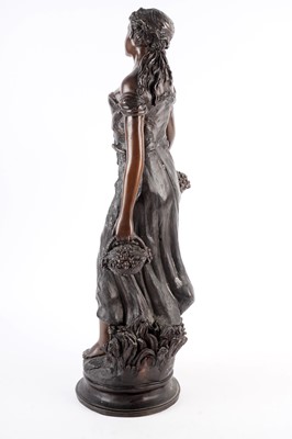 Lot 483 - A patinated bronze figure of a farmhand