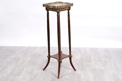 Lot 68 - A 20th Century empire style mahogany jardinière stand
