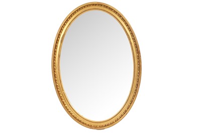 Lot 124 - A gilt framed oval wall mirror