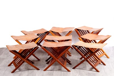 Lot 76 - A set of nine Kenyan folding stools
