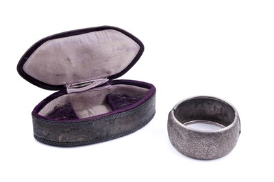 Lot 352 - An Edwardian silver mounted ring box; and a Victorian silver bangle