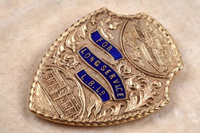 Lot 232 - A 9ct gold Long Service award, dated 1936