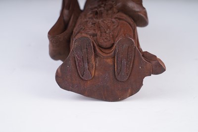 Lot 350 - A Chinese hardwood figure