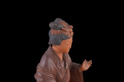 Lot 350 - A Chinese hardwood figure
