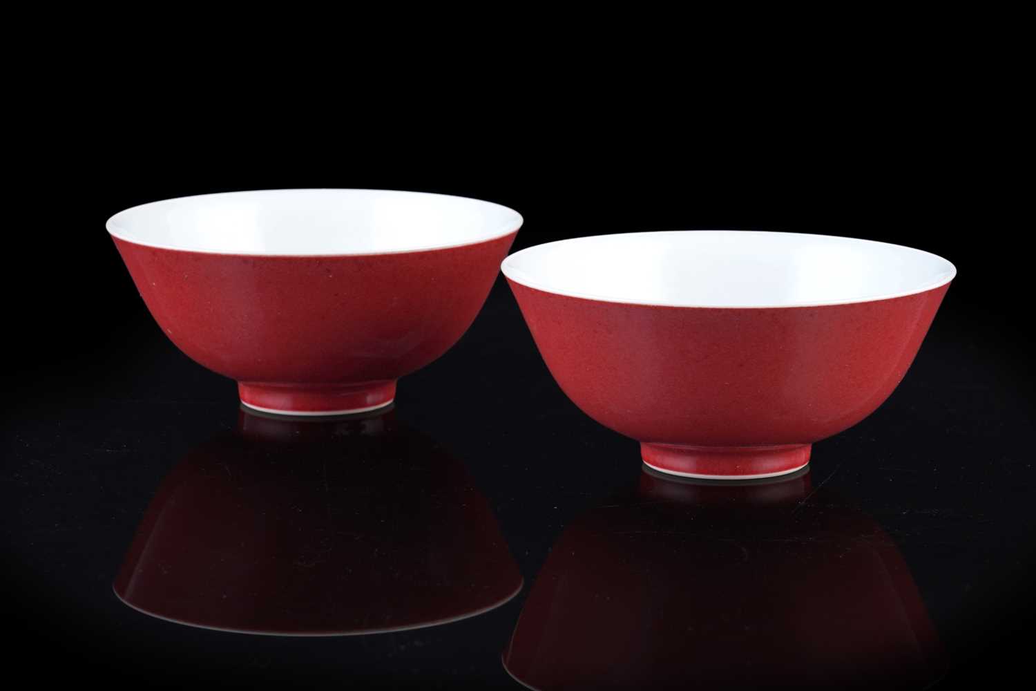 Lot 309 - A pair of Chinese liver-red bowls