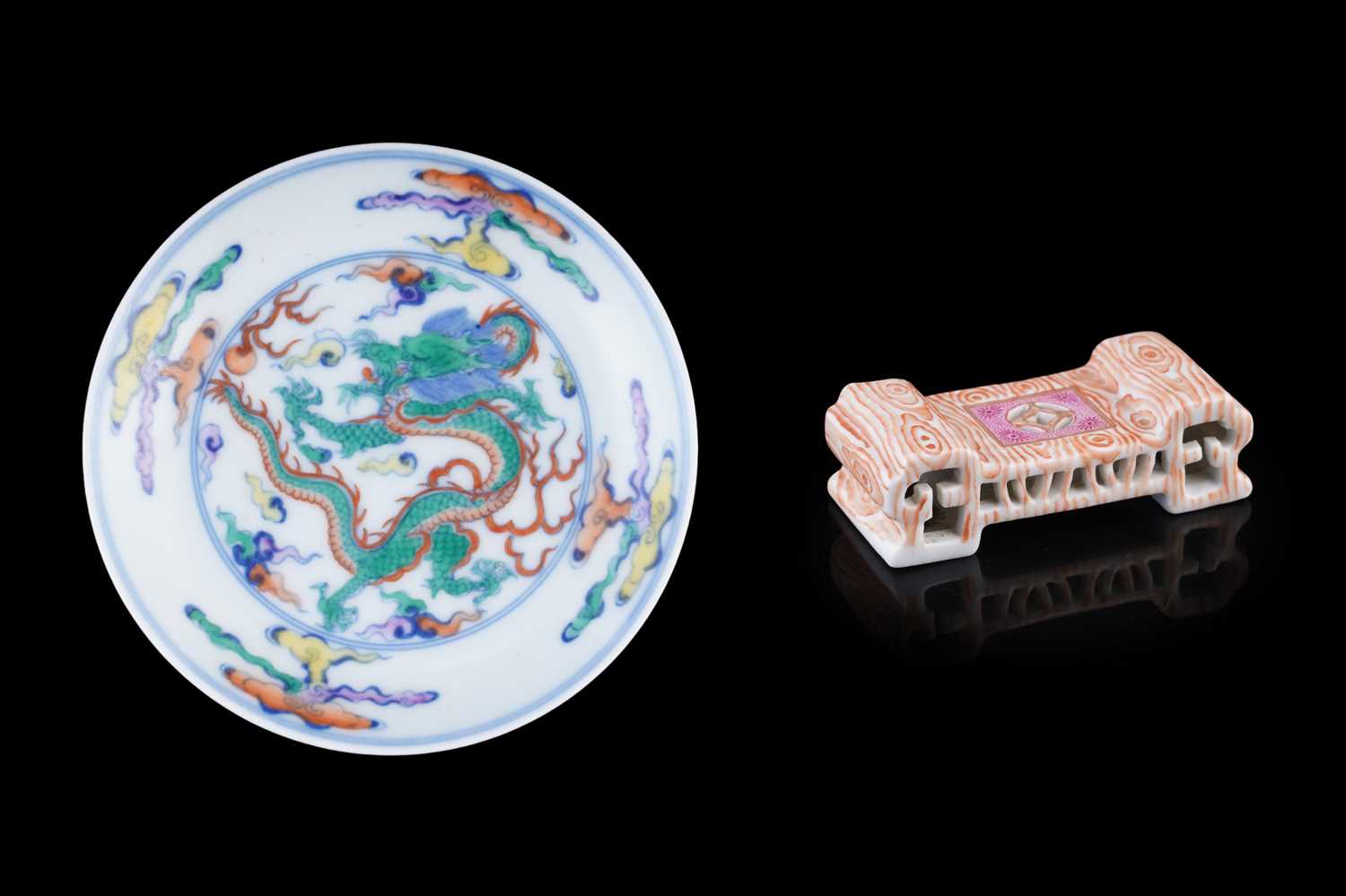 Lot 319 - A Doucai saucer; and a faux bois brush rest
