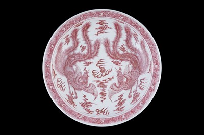 Lot 332 - A Chinese liver-red decorated charger