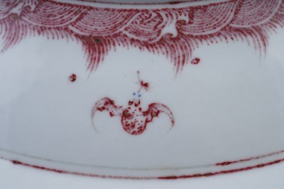Lot 332 - A Chinese liver-red decorated charger