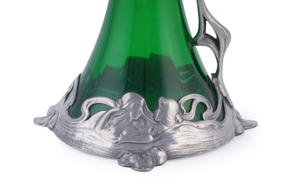 Lot 490 - WMF: and early 20th Century Art Nouveau pewter and green glass claret jug