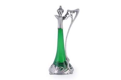 Lot 490 - WMF: and early 20th Century Art Nouveau pewter and green glass claret jug