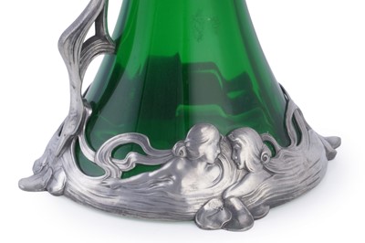 Lot 490 - WMF: and early 20th Century Art Nouveau pewter and green glass claret jug