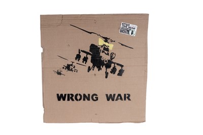 Lot 107 - BANKSY - Happy Choppers (WRONG WAR) | spray paint on cardboard
