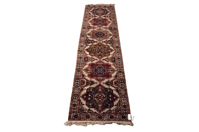 Lot 539 - A hand-knotted Persian Kashan runner