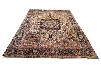 Lot 559 - An early 20th Century hand-knotted Persian Kirman carpet