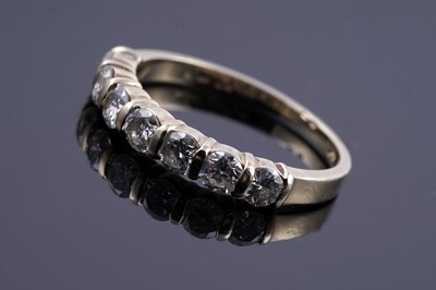 Lot 240 - A contemporary diamond half hoop eternity ring