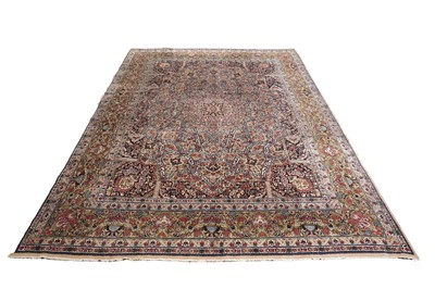 Lot 554 - An early 20th Century hand-knotted Persian Lavar Kirman carpet