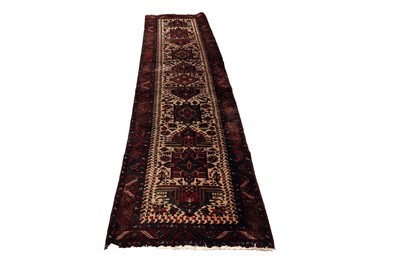 Lot 537 - A hand-knotted Persian Heriz runner