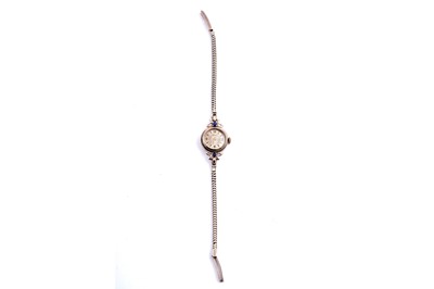Lot 313 - A lady's 9ct gold Elco cocktail watch set with sapphires