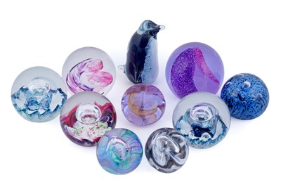 Lot 321 - A collection of glass paperweights
