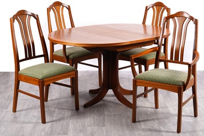 Lot 106 - Nathan: a teak extending circular dining table; and four chairs