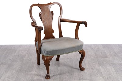 Lot 27 - An unusual George I-style walnut armchair
