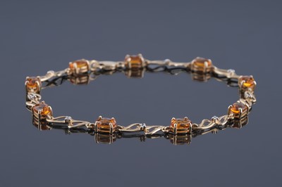 Lot 186 - A modern citrine and diamond bracelet