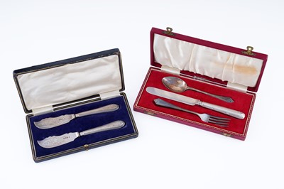 Lot 322 - A Victorian cased silver butter knife set; and christening knife, fork, and spoon