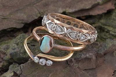 Lot 263 - Three rings, including: an Edwardian opal ring; and a 1912 dated diamond ring