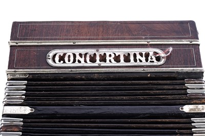 Lot 6 - A Bandoneon concertina; and another