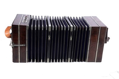 Lot 6 - A Bandoneon concertina; and another
