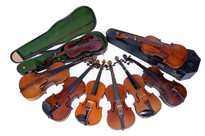Lot 573 - A selection of eight violins