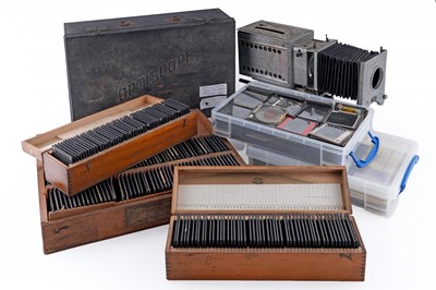 Lot 457 - A large collection of early 20th Century glass Magic Lantern slides; and a ‘Optiscope’ projector