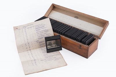 Lot 457 - A large collection of early 20th Century glass Magic Lantern slides; and a ‘Optiscope’ projector