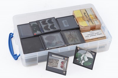Lot 457 - A large collection of early 20th Century glass Magic Lantern slides; and a ‘Optiscope’ projector