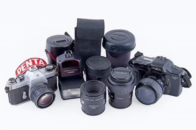 Lot 516 - Two cameras; and two Minolta lenses