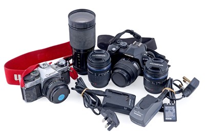 Lot 517 - Two cameras; and two lenses