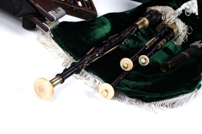 Lot 36 - A Reid Northumbrian small pipes; and a set of mahogany bellows with curved arms