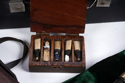 Lot 36 - A Reid Northumbrian small pipes; and a set of mahogany bellows with curved arms