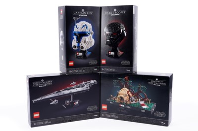 Lot 553 - Four boxed Lego kits
