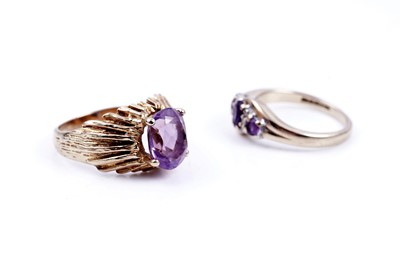 Lot 274 - Two mid-Century modern amethyst rings