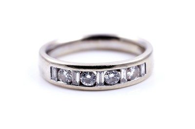 Lot 276 - A modern diamond half hoop eternity ring