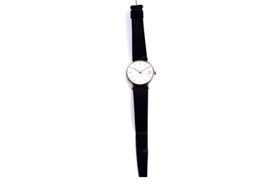 Lot 298 - A 9ct gold cased Garrard wristwatch | Dunlop interest