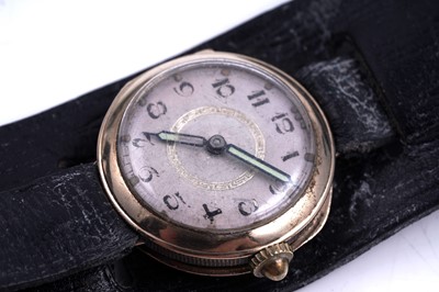Lot 312 - An early 20th Century 9ct rose gold cased wristwatch on a bund strap