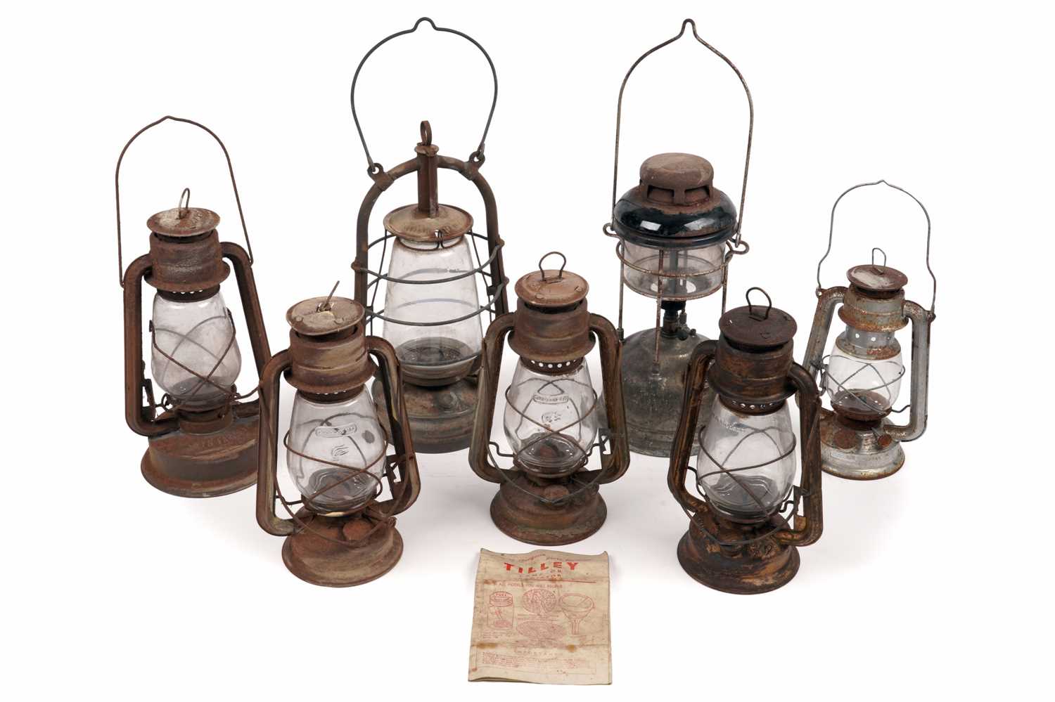 Lot 479 - A collection of seven Tilley lamps