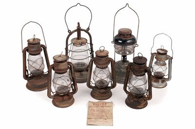 Lot 479 - A collection of seven Tilley lamps